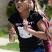 Carpenter Elementary school fourth grader Chala House, sticks her tongue out as she dances to the beat of the Huron High School drumline outside of the school for a 175th birthday celebration on Friday, April 26, 2013. Melanie Maxwell I AnnArbor.com 